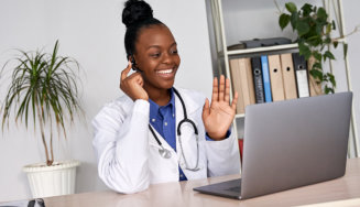 doctor talking with someone virtually