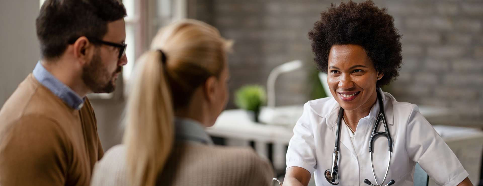 couple talking to a doctor